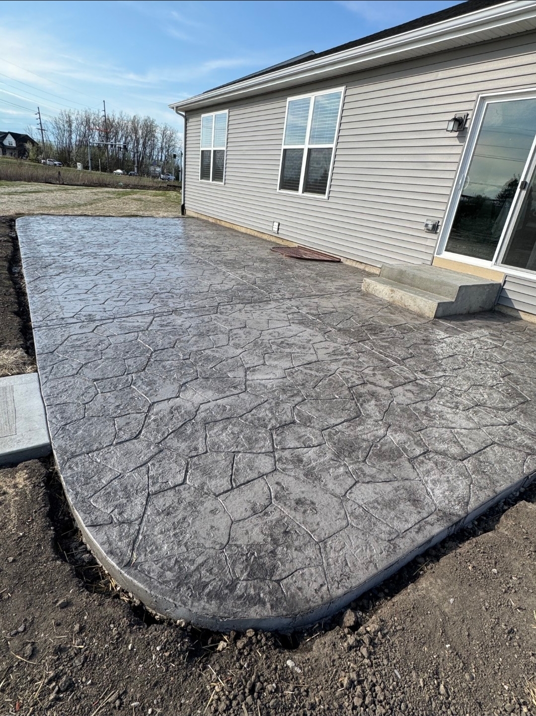 Stamped concrete patio by Artesan Concrete in Northwest Indiana