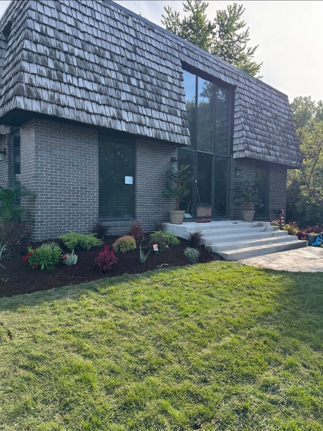Concrete front steps and entryway